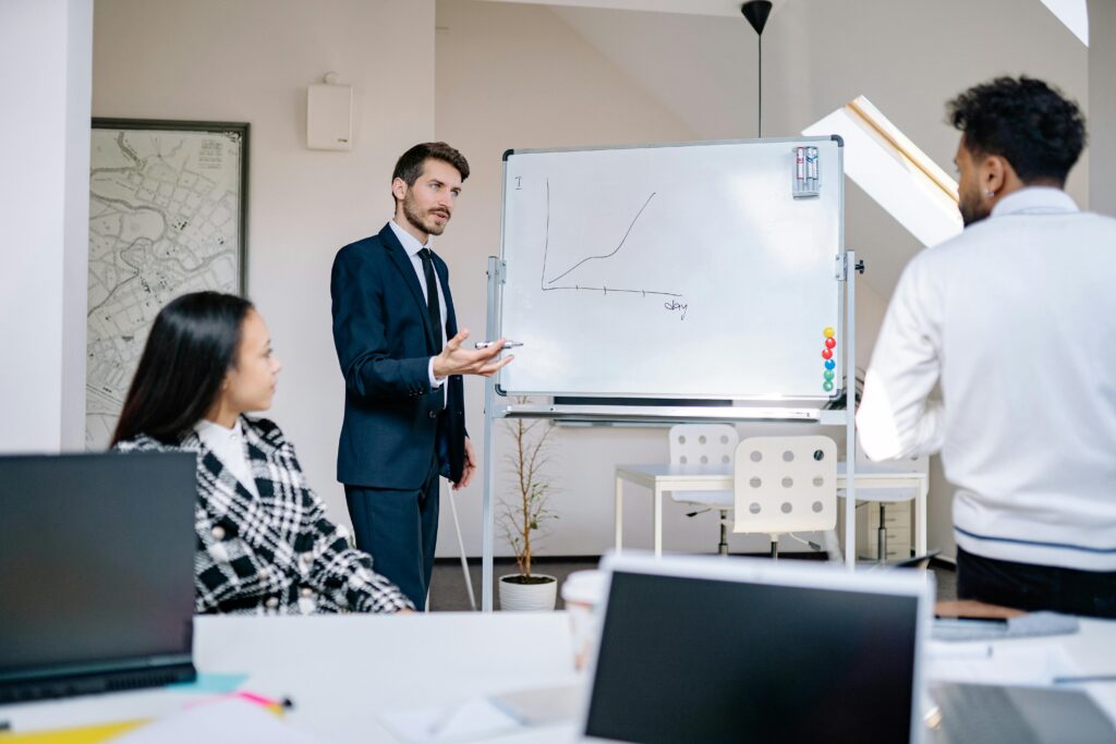 Foreign workers in a modern office in Germany discussing job opportunities