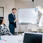 Foreign workers in a modern office in Germany discussing job opportunities